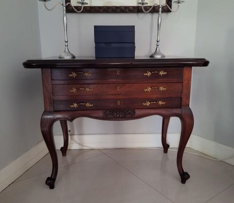 Vintage-style mahogany table with ball and claw legs and eight upholstered chairs. With French High-leg XV Antique sideboard and Chest of drawers